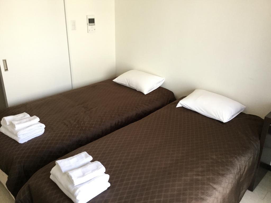 Mr.Kinjo In Kume Lejlighedshotel Naha Eksteriør billede